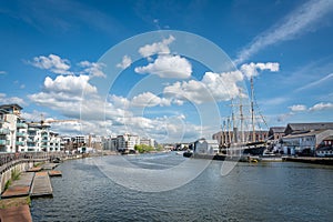 Beautiful Bristol Harbour under the cloudy sky in England photo