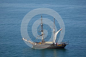 Beautiful Brixham seascape with an historic sailing ship from Berry Head Brixham Devon looking out to sea