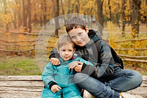 Beautiful brothers who are smiling happily together. Two happy boys