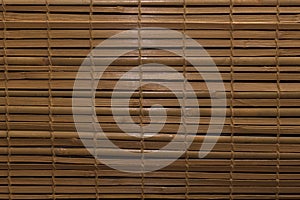 Beautiful brown horizontal bamboo mat texture background
