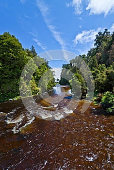 Beautiful brown vulcanic river - New Zealand