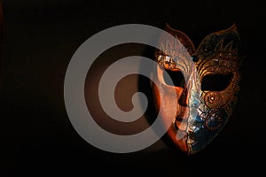 Beautiful Brown Wood Mask In Dramatic Spot Light