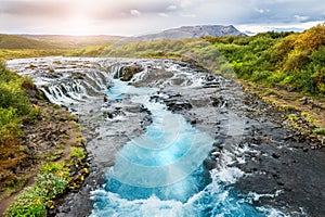 Beautiful Bruarfoss waterfall with turquoise water in Iceland