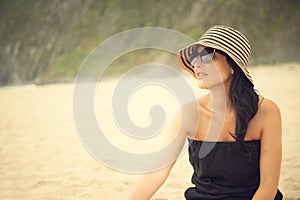 Beautiful brunette at the beach