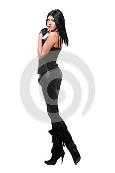 Beautiful brunette in black leggings. Isolated
