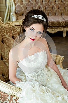 Beautiful brunette Bride portrait wedding makeup and hairstyle with diamond crown