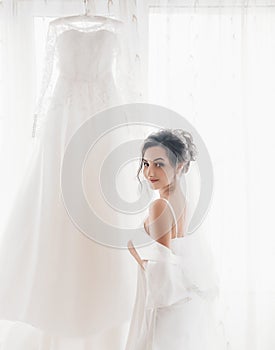 Beautiful brunette bride with stylish make-up