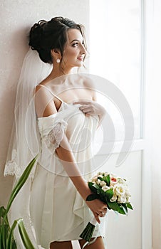 Beautiful brunette bride with stylish make-up