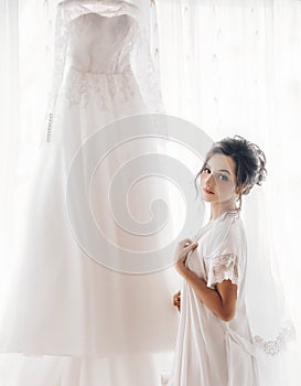 Beautiful brunette bride with stylish make-up