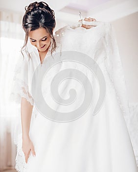 Beautiful brunette bride with stylish make-up