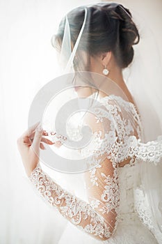 Beautiful brunette bride with stylish make-up