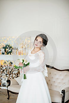 Beautiful brunette bride with stylish make-up