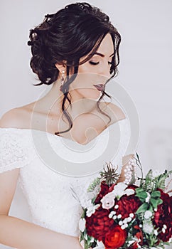 Beautiful brunette bride with stylish make-up