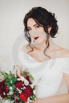 Beautiful brunette bride with stylish make-up