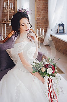 Beautiful brunette bride with stylish make-up