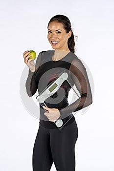 Beautiful Brunette Fitness Model Managing Her Weight And Diet