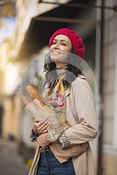 Beautiful brunette with french baguettes