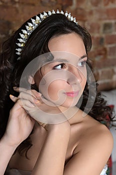 Beautiful brunette girl with curls