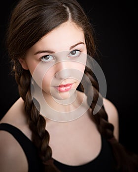 Beautiful Brunette Girl With Plaits photo