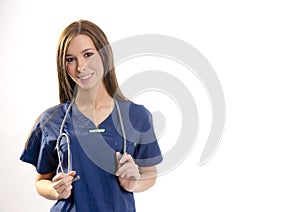 Beautiful Brunette Nurse Holds Her Stethoscope Looking at Camera