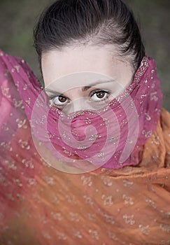 Beautiful brunette portrait wearing scarf