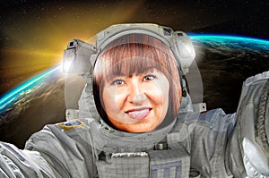 Beautiful brunette portrait woman astronaut or cosmonaut exploring the universe.