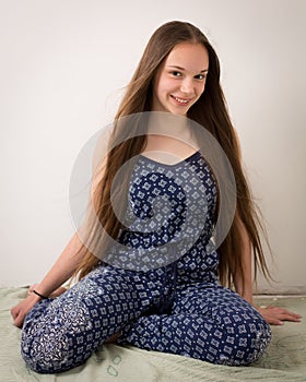 Beautiful Brunette Teenage Girl In Blue Pajamas