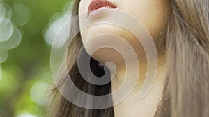 Beautiful brunette woman closed eyes meditation in park, inner peace, calm mind