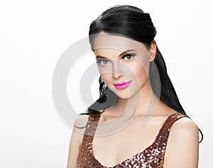 Beautiful brunette woman with eyelashes extension and long black curly hairstyle pink lipstick