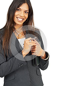 Beautiful brunette woman holding a daybook