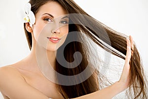 Beautiful Brunette Woman Portrait with Long Hair.