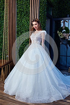 beautiful brunette woman pretty bride wedding big day marriage ceremony in summer garden wearing long silk and lace white