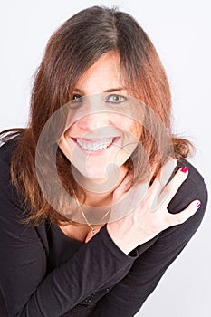 Beautiful brunette woman smiling, portrait