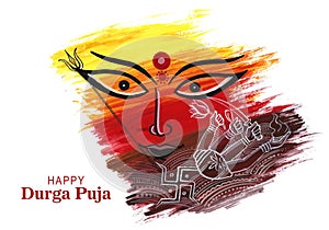 Beautiful brush stroke durga face on durga puja festival card background