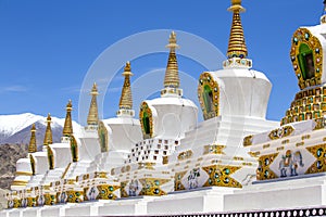 Beautiful buddhist stupa with the cliff and blue sky at Thiksey Monastery in Ladakh, India.