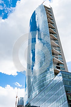 Beautiful building reflecting clouds