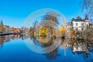 Beautiful buildings stretched alongside Svartan river in Orebro, Sweden