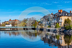 Beautiful buildings stretched alongside Svartan river in Orebro, Sweden