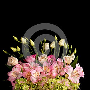 Beautiful bunch of colorful flowers on black background