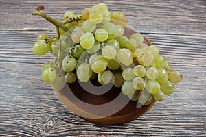 Beautiful bunch of white grapes to make wine of good smell and taste photo