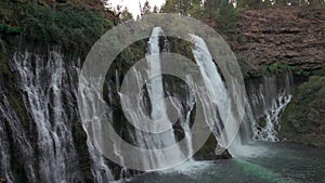 Beautiful Burney Falls in California. Panning shot.