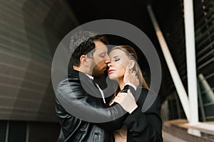 Beautiful business couple in love enjoy each other, kiss. Valentine`s day