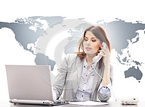 Beautiful business woman answering international calls