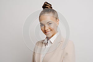 Beautiful business woman with confident look in eyes