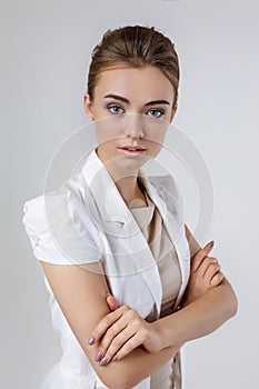 Beautiful business woman with crossed arms.