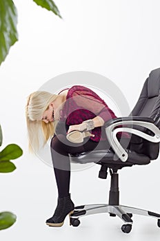 Beautiful business woman doing yoga stretching