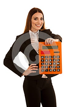 Beautiful business woman holds a large calculator isolated over