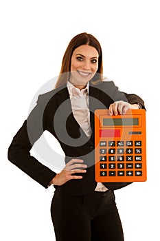 Beautiful business woman holds a large calculator isolated over