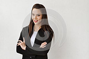 Beautiful business woman on plain background