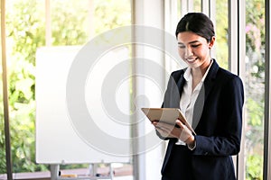 Beautiful Business Woman secretary in office at workplace,Asian